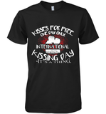 Womens Funny, International Kissing Day, Kisses for free. One day V Neck T Shirt Premium Men's T-Shirt